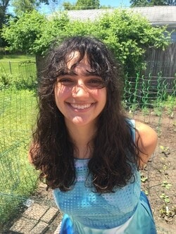 Image of Ms. Pawlowski in her garden. 