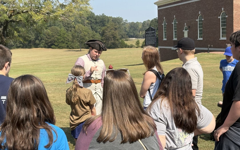 American Village – Students learning about the American Revolution. 