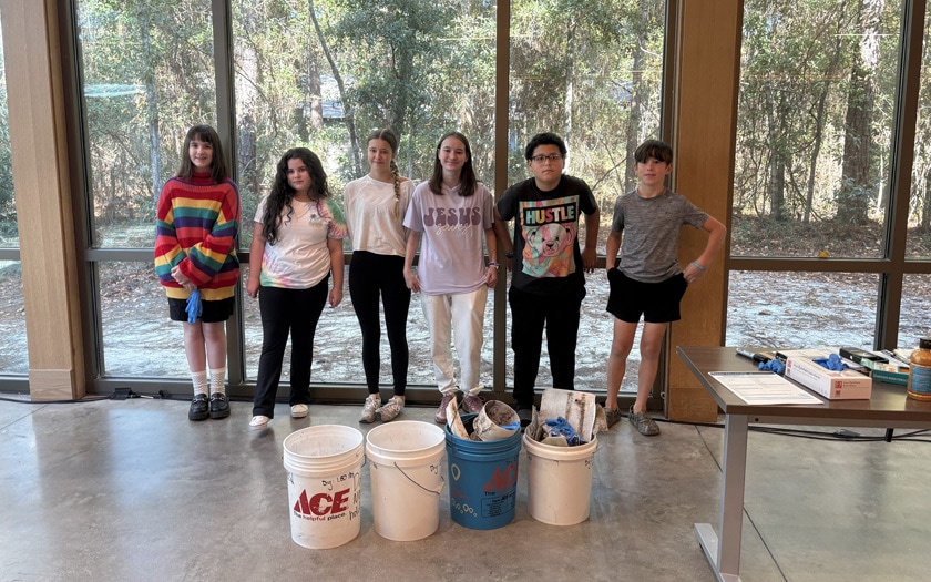 Learning Campus: Eco Art: Students learning about oysters and the role they play in the Gulf, as well as helping pick up trash!