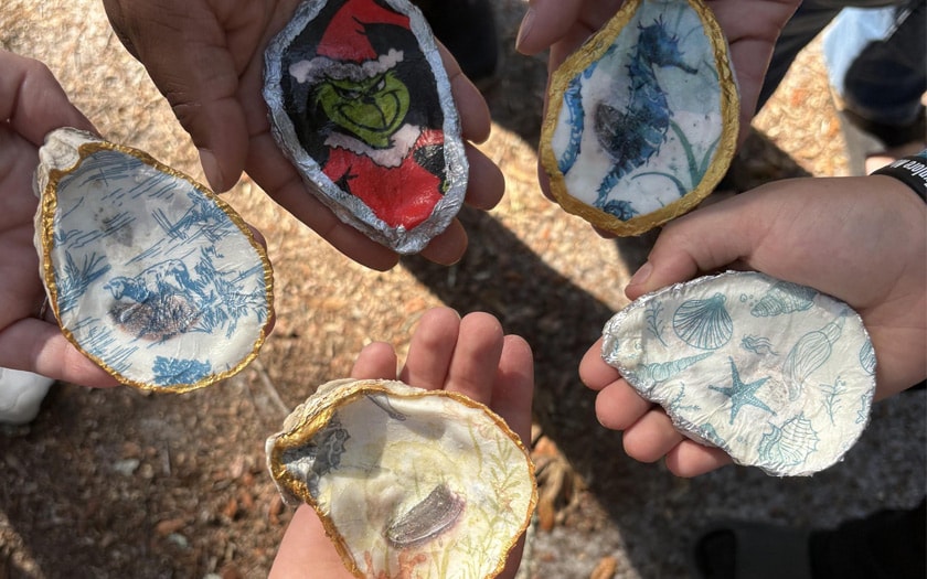 Learning Campus: Eco Art: Students learning about oysters and the role they play in the Gulf, as well as helping pick up trash!