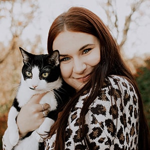 Image of Allayna from Indiana Connections Career Academy pictured here holding her cat. 