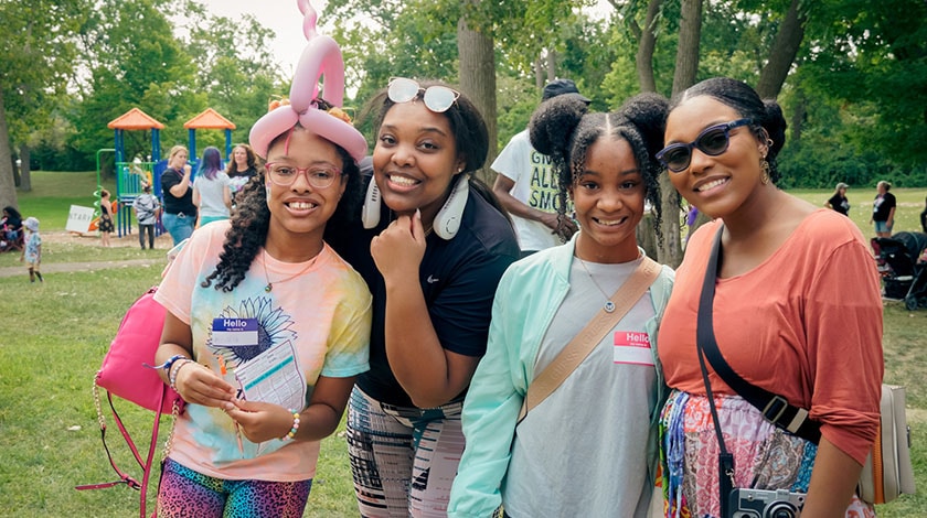 Students hang out together at a park