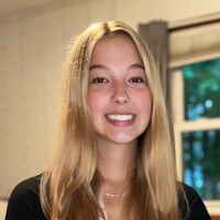 Image of Megan C, a graduate of Michigan Connections Academy. She is wearing a black shirt. 