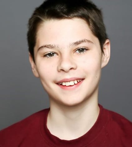 Image of James in a red shirt - a student at Minnesota's Falcon View Connections Academy