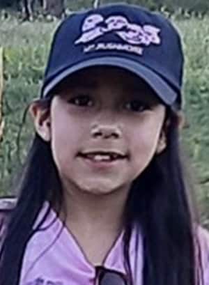 Image Abigail P, who is a student at Minnesota Connections Academy and is wearing a purple shirt and a blue hat. 