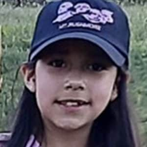 Image of Abigail, a student at Minnesota Connections Academy in a blue and purple ball cap.