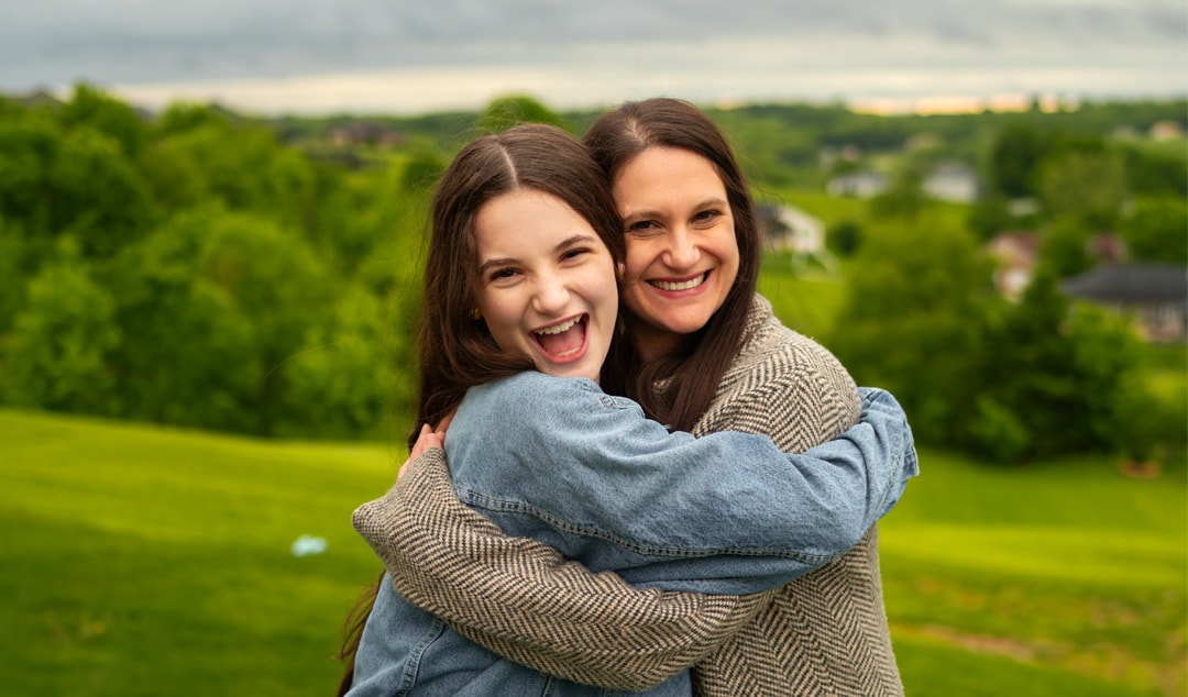 Missouri Connections Academy, Ella, hugging her mom