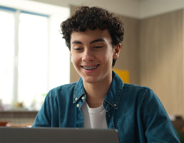 Student working at his laptop
