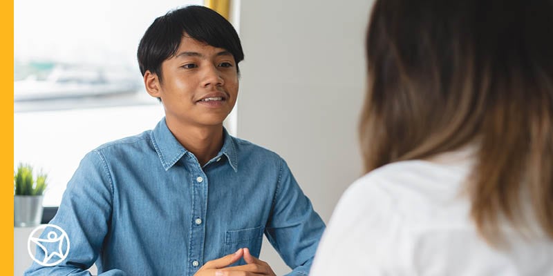 A student speaking to a working professional