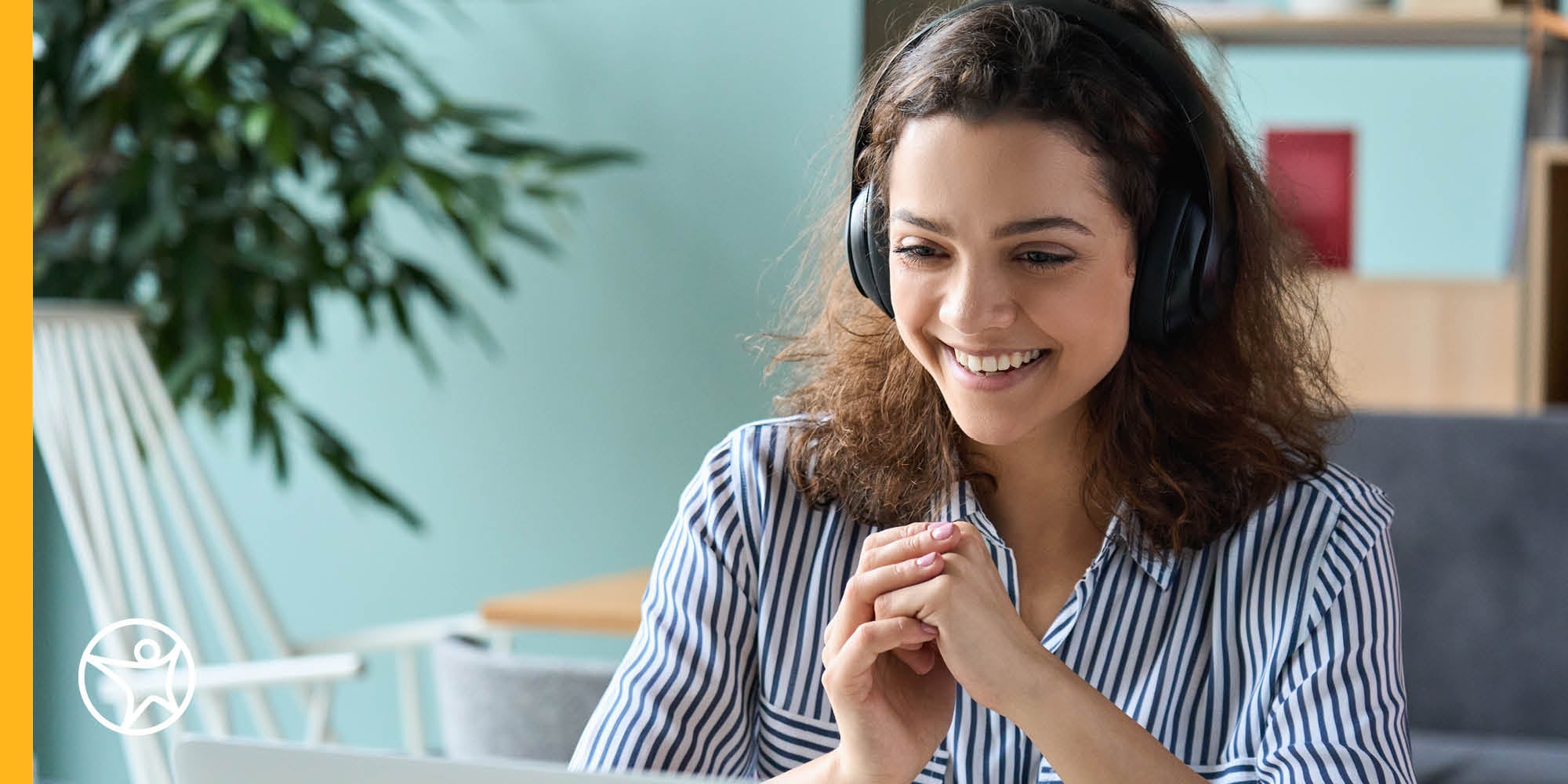 An online school Learning Coach with headphones on