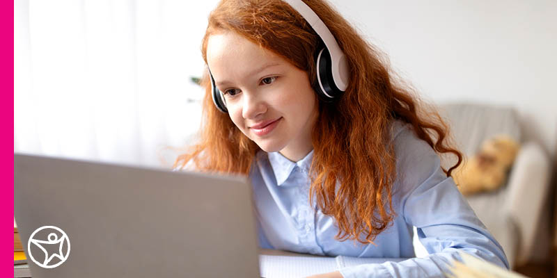 A middle school student on her school laptop.