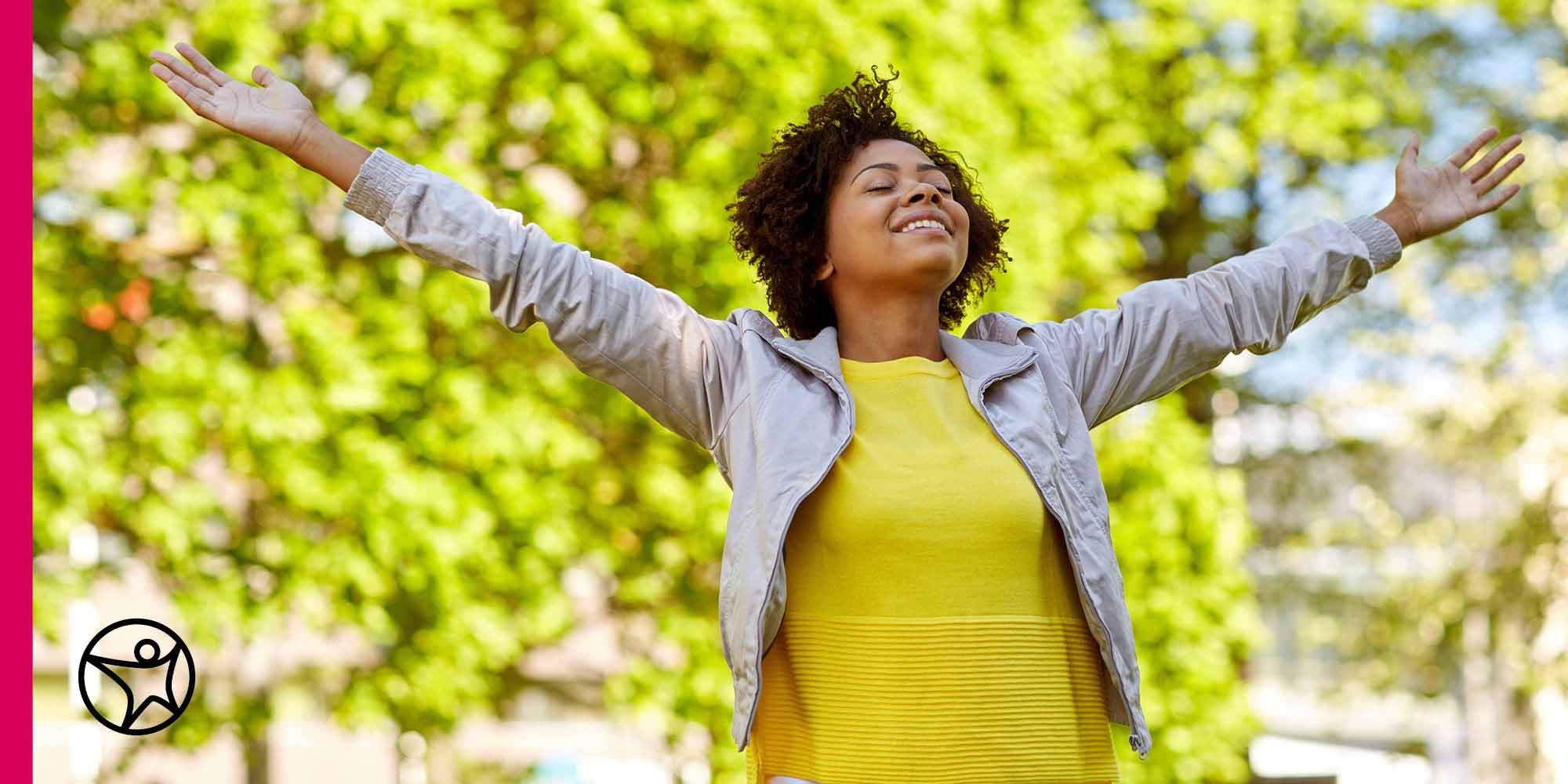 Image of a student in a yellow shirt enjoying her senior year.