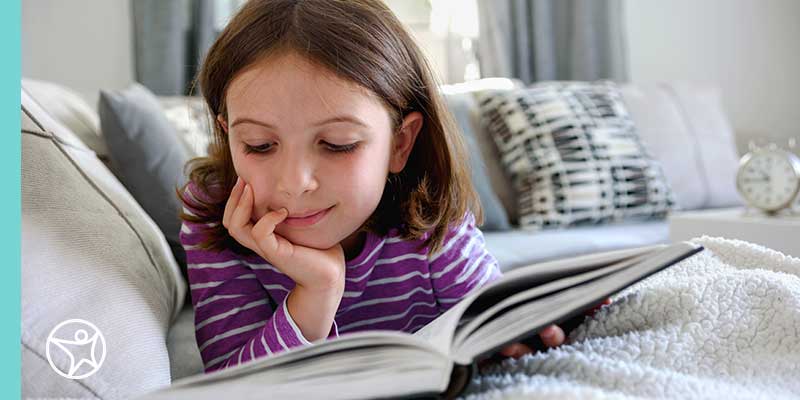Child Reading a Book