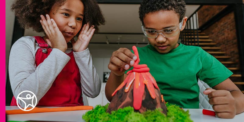 Two students working on creative work projects