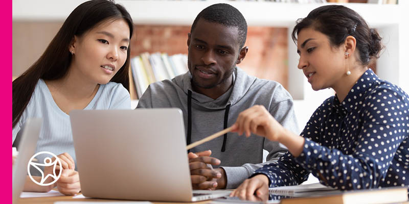 High school students studying with laptop computer