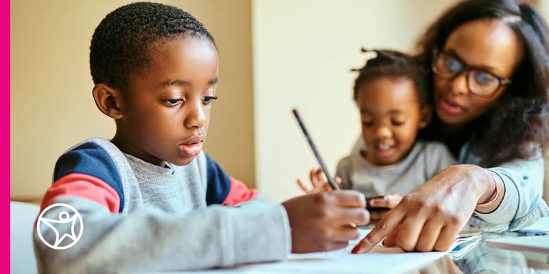 A Learning Coach mother and her son are working on an online assignment together at Connections Academy.
