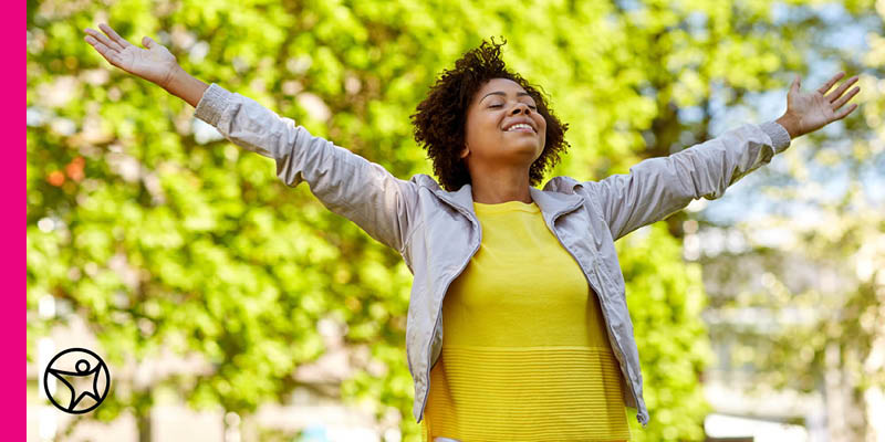 A teenage student is writing what she is greatful for in her notebook