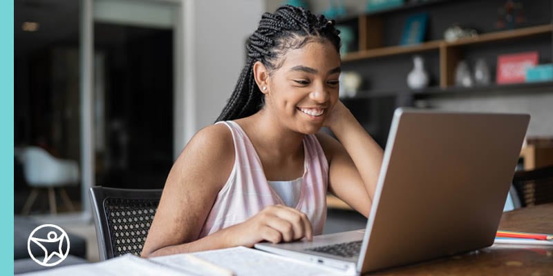 A Connections Academy online school student attending class on her laptop.