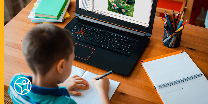Student learning and taking notes.