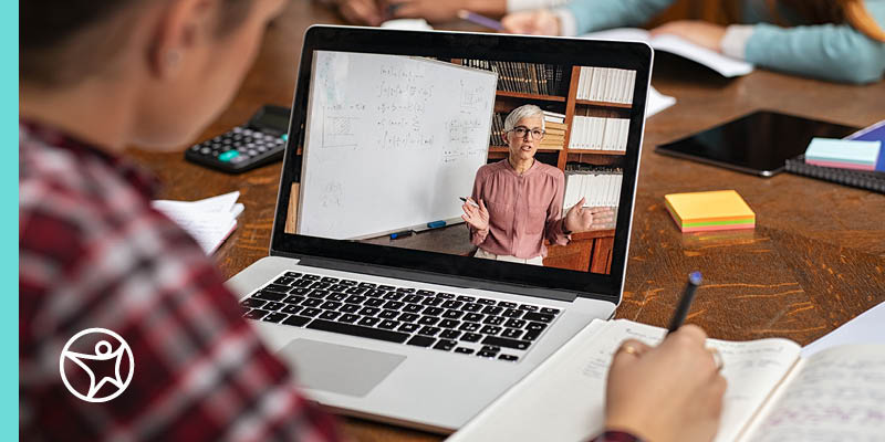 Student learning and taking notes.