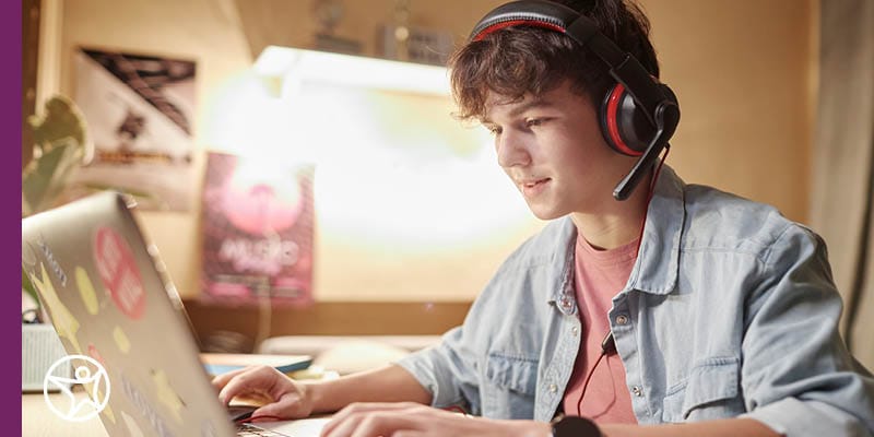 A student working on his laptop