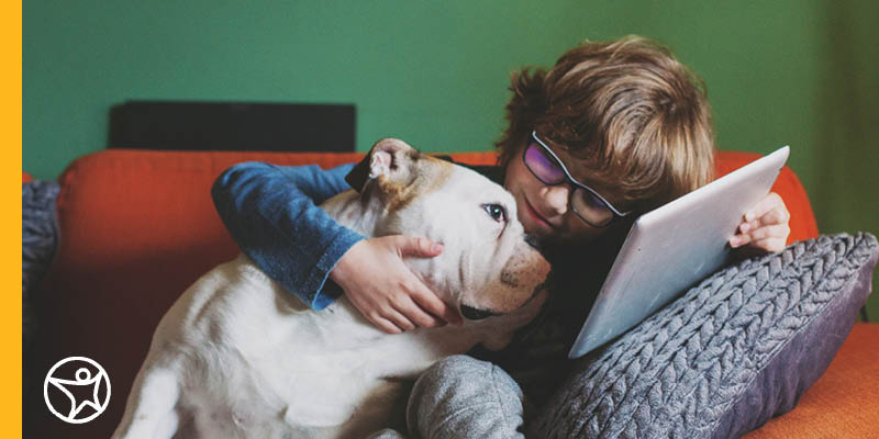 A student working with a dog