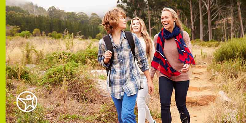 Student with his parent on a hike out west during their Connections Academy summer break.