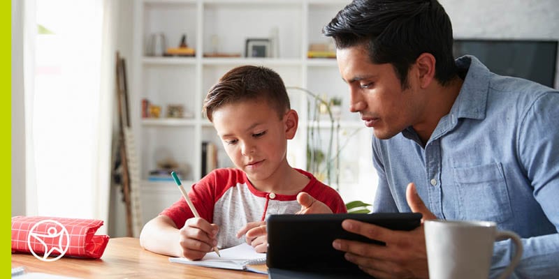 Father as his son's Learning Coach teaching him about how criticism can be a tool for growth