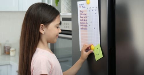 A student checks her daily schedule.