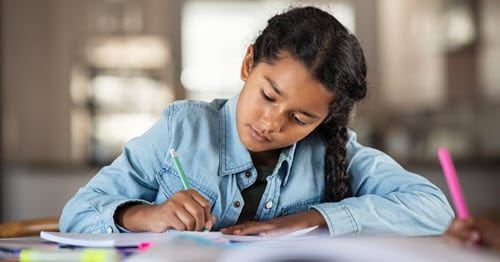 A student studies for her tests.