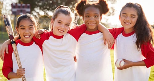 A group of kids who are part of a learning pod prepare for sporting events for online school students.