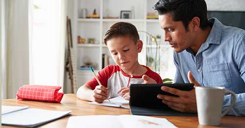 A parent helping to teach stress management to his child.