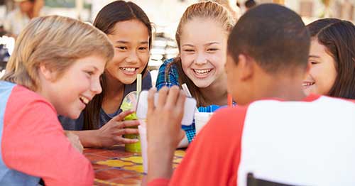 A group of kids socializing.