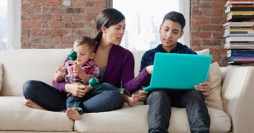 A student and parent learning how to transfer to online high school. 