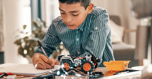 A student working on a STEM project using inquiry-based learning.