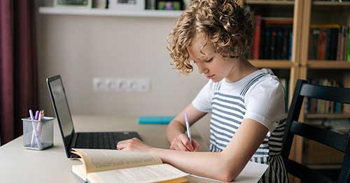 A student multitasking and learning effectively.