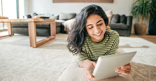 An online student researching World Smile Day. 