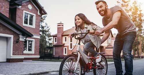 Two people spending time together as a family outdoors. 