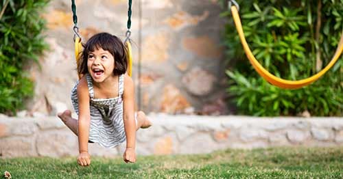 A girl playing outside.