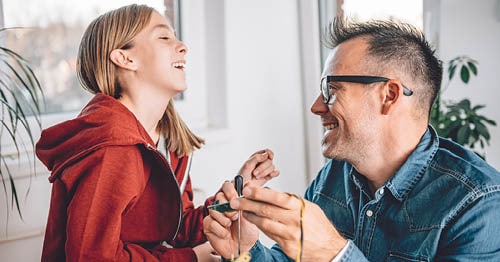 A Learning Coach helping his online student with school-related anxiety. 