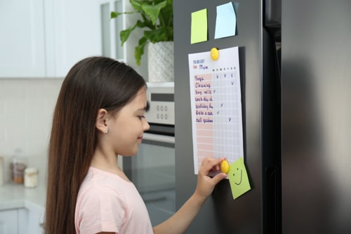 A student checking her schedule for the day.