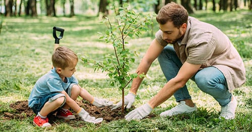 A Learning Coach and online student participating in Earth Day activities for elementary school.