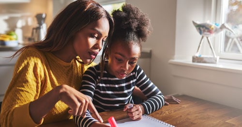 A full-time working parent helps her online student as her Learning Coach. 