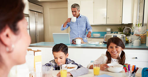 A family eating a healthy breakfast together.