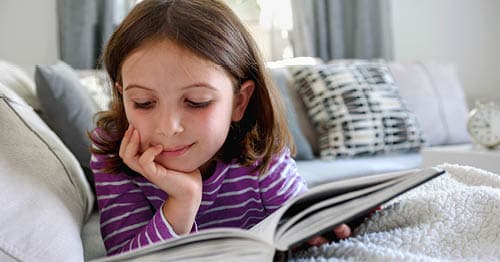 An online school student improving reading comprehension skills. 