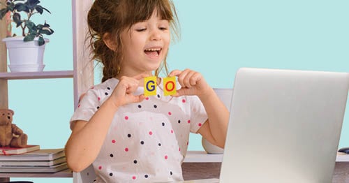 A kindergartener becoming more independent learner in online school.