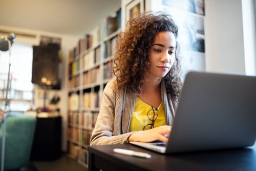 An online student studying for college entrance exams.