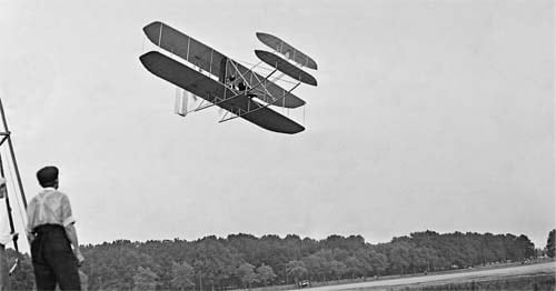 The Wright brothers practice flying for their first flight in Kitty Hawk, NC. 