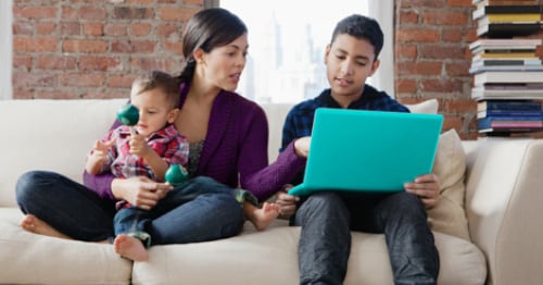 A parent monitoring her child’s online activity. 