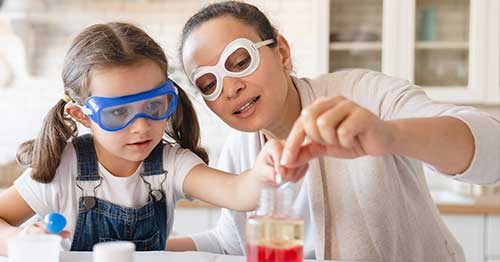 Image of Connections Academy students with her Learning Partner working on a stem project